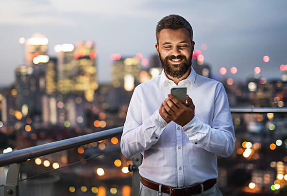 man looking at his smartphone