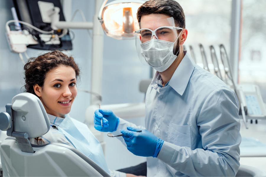 young girl gets a routine cleaning and exam from the dentist