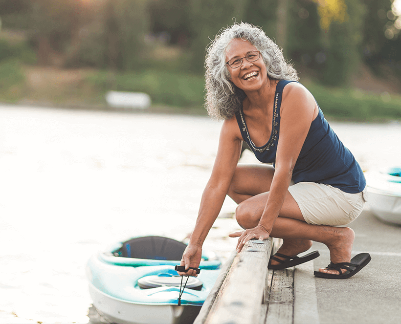 senior woman with kayak