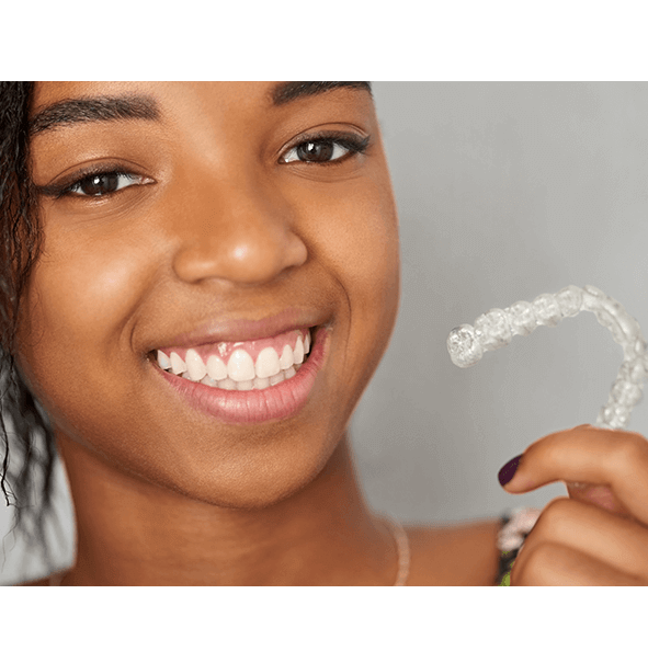 girl with clear aligner