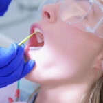 dental patient undergoing fluoride treatment