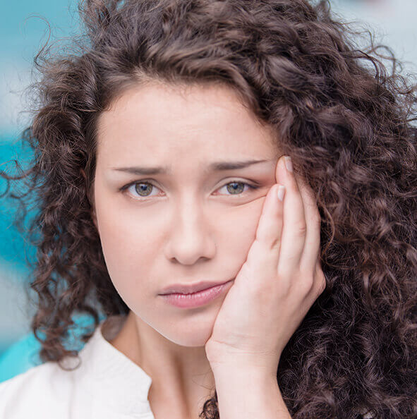 woman with jaw pain