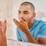 man checking for bad breath looking for halitosis treatment