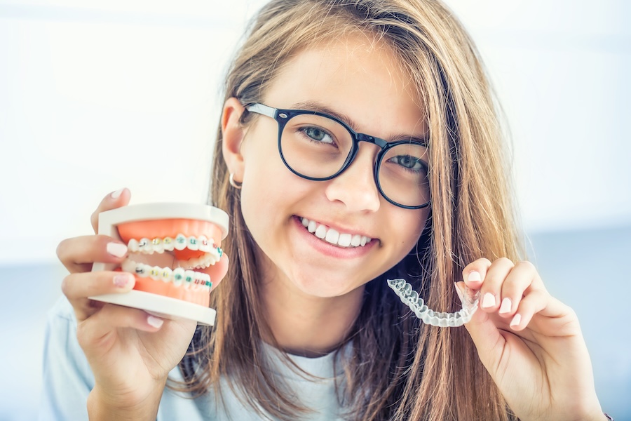 invisalign clear aligners vs metal braces